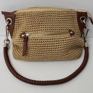 The Sak faux straw/leather purse with silver touch